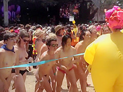 Naked students get ready to compete in a marathon