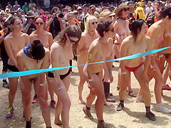 Naked students get ready to compete in a marathon