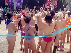 Naked students get ready to compete in a marathon
