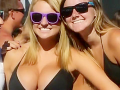 Blonde babe in black bikini has huge tits
