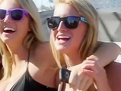 Blonde babe in black bikini has huge tits