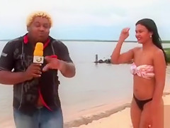 Smoking hot Brazilian sex bomb poses on the sandbeach