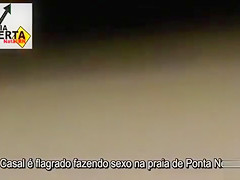 Italian lovers having missionary sex on the beach