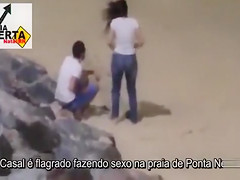 Italian lovers having missionary sex on the beach