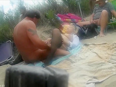 Sex at the nude beach caught on tape by voyeur