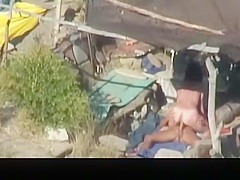 Nude couple banging in the beach