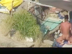 Nude couple banging in the beach