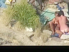 Nude couple banging in the beach