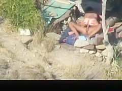 Nude couple banging in the beach