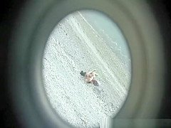 Voyeur films couple fucking in beach