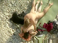 Voyeur films couple fucking in beach
