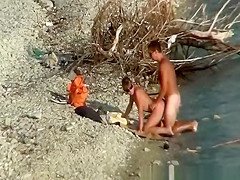 Nudist couple fucking by the water