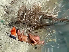 Nudist couple fucking by the water