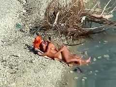 Nudist couple fucking by the water