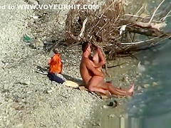 Nudist couple fucking by the water