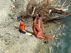 Nudist couple fucking by the water