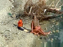Nudist couple fucking by the water