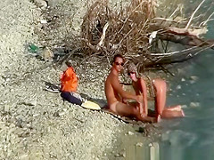 Nudist couple fucking by the water