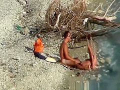 Nudist couple fucking by the water