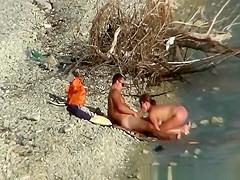 Nudist couple fucking by the water