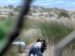 Couple fucking in dunes