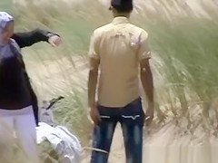 Couple fucking in dunes