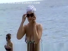 Exposed nipple at beach