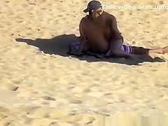 Blonde girl rides her boyfriend’s dick in beach