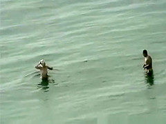 Nudist fucked hard on rocky beach