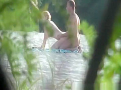 Nudist couple fucking in the beach