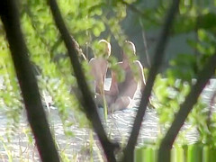Nudist couple fucking in the beach