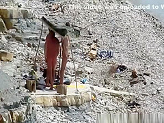 Nudist couple fucking in the water and shore