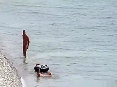 Nudist couple fucking in the water and shore