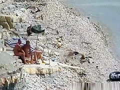 Nudist couple fucking in the water and shore