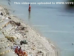 Nudist couple fucking in the water and shore
