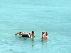 Nudist couple fucking in the water and shore