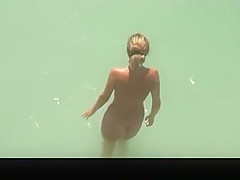 Nudist couple caught fucking under tent