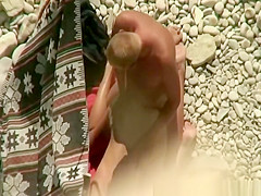 Doggy style beach sex