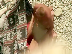 Doggy style beach sex