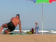 Wife handjob at beach