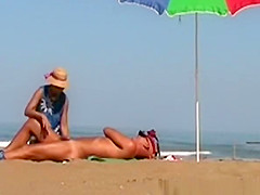 Wife handjob at beach