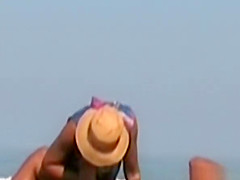 Wife handjob at beach