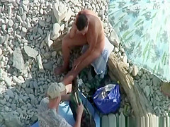 Nudists film their threesome at beach