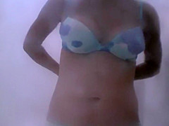Hot mature woman dresses after a beach