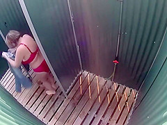 Milf shaves her pussy in a beach cabin