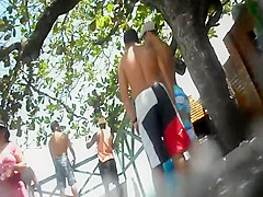 Voyeur checks out a tanned bubbly butt