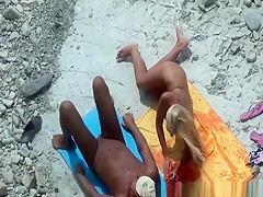 Nudist woman fucked in the rocky beach