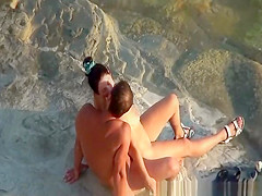 Nudist couple handjob and pussy eating