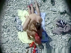 Horny couple in the beach having sex