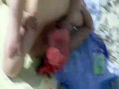 Horny couple in the beach having sex